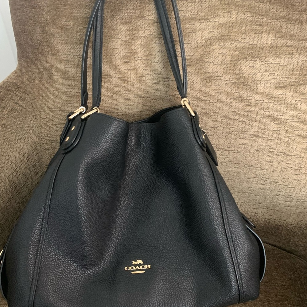 COACH Black bag. Authentic!! Excellent condition. Gold accents.